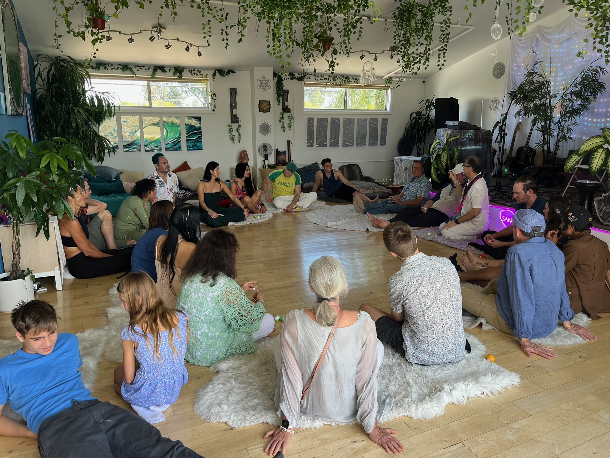 Community circle seated on the floor Community circle seated on the floor